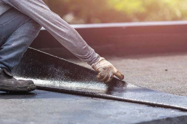 Professional Emergency Waterproofing technician working in Montevallo, AL